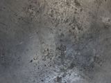 a large metal pan sitting on top of a stove