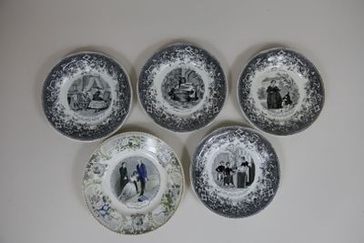 four plates with pictures of people on them on a white surface