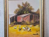 an oil painting of geese in front of a barn on a table