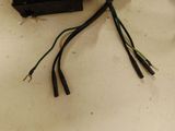 two wires that are connected to a device on the table
