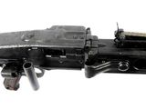 a toy gun that is sitting on top of a table