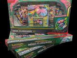 trois boîtes de cartes Pokémon sont empilées les unes sur les autres