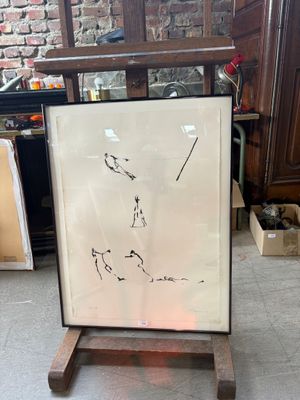 a picture of a drawing on a easel in a room