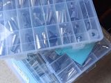 a plastic box with many different types of tools in it