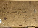 a piece of paper with writing on it sitting on a table
