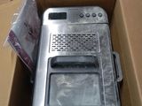 a box with a microwave inside of it sitting on a table
