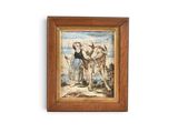 tableau encadré représentant un homme et deux vaches sur une plage