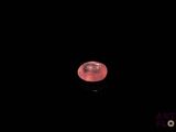 an image of a pink ball in the dark