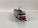 a toy train that is sitting on a white surface