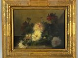 an oil painting of flowers in a gold frame on a table
