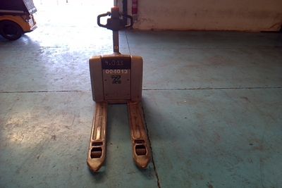 a forklift that is sitting in a garage