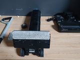 two different types of tools sitting on a wooden table