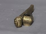 a small metal object that is sitting on a table