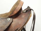 a saddle that is sitting on top of a stand