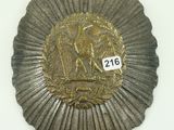 a metal plaque with a picture of a horse on it