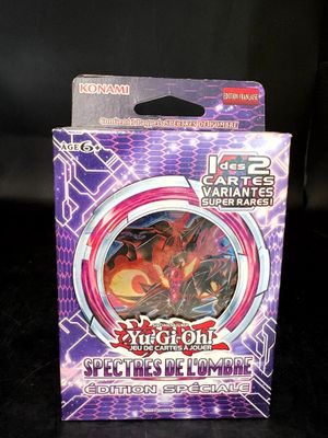 une image représentant une boîte de jeu de cartes sur laquelle figure l'illustration d'un dragon