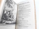 an open book with a picture of a man riding a horse