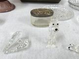 a lot of glass objects on the table