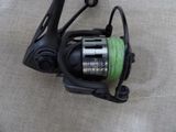a reel that is sitting on the ground