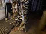 a pile of pipes and pipes in a room