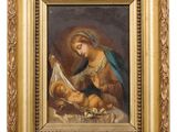 a painting of a woman holding a baby in a gold frame