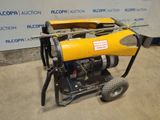 an image of a yellow machine sitting on top of a cement floor