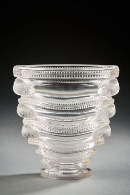 a clear glass vase with a spiral design on it