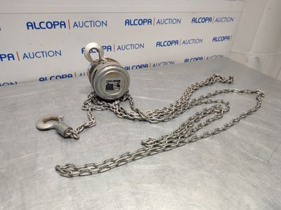 a close up of a chain with a lock on it on a table