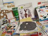 a lot of crafting supplies on the table