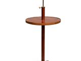 an image of a wooden table with a lamp on top of it