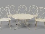 four chairs and a table with a table and chairs around it