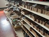 many boxes of assorted items on the shelves in the store