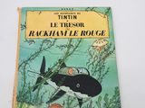 an old children ' s book with a picture of a whale and a fish