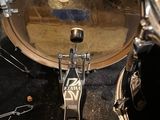 a close up view of a drum set on the floor