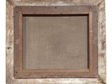 an old picture frame with a linen backing and a wood frame