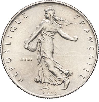 une image représentant une pièce d'argent sur laquelle figure une femme en train de marcher