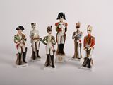 five figurines of men dressed in military uniforms