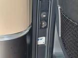 a close up of a seat with a cup on it