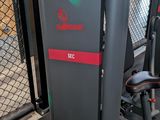 a machine that is sitting in the middle of a gym