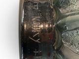 a close up of a glass vase with broken glass