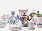 many different types of pottery on the table