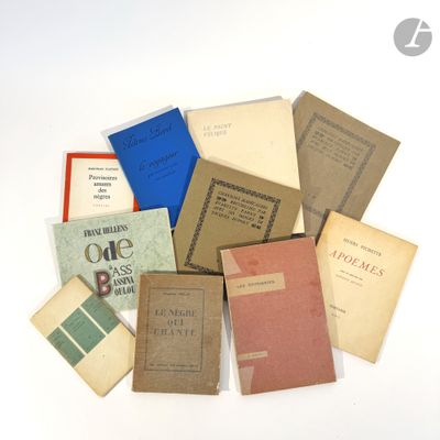 a lot of books that are sitting on a table