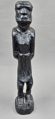 an image of a statue of a man with a hat on his head