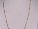 a gold chain necklace on a mannequin mannequin mannequin mannequin mannequin mannequin mannequin mannequin manne