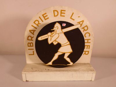 plaque of a baseball player holding a bat with the words library de l ' arche on it