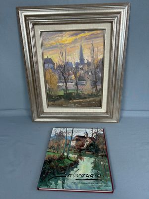 une photo représentant un tableau et un livre posés sur une table