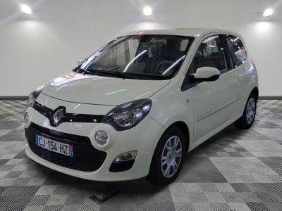 a picture of a white car parked in a garage