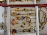 a box of jewelry that is sitting on a table