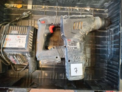 a drill and a drillet sitting in a box