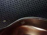 a close up of a metal sink with a metal faucet